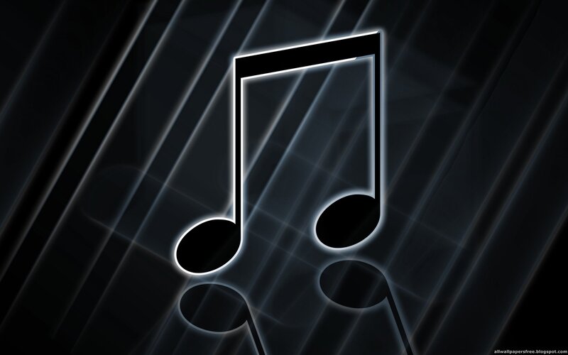 glowing music note on dark background