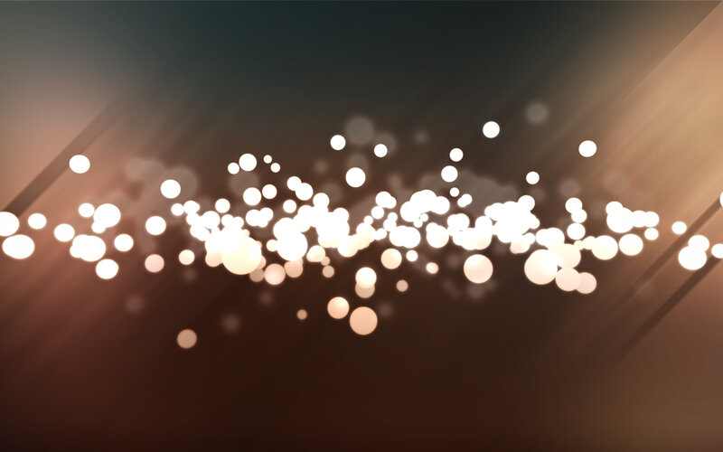 glowing particles in motion