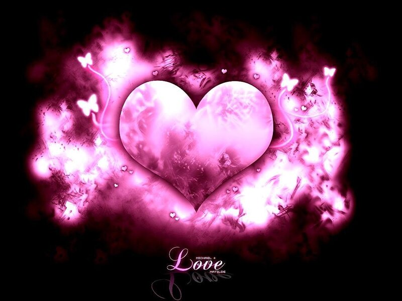 glowing pink heart with butterflies
