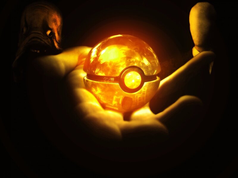 Glowing Pokeball in Hand — Orange