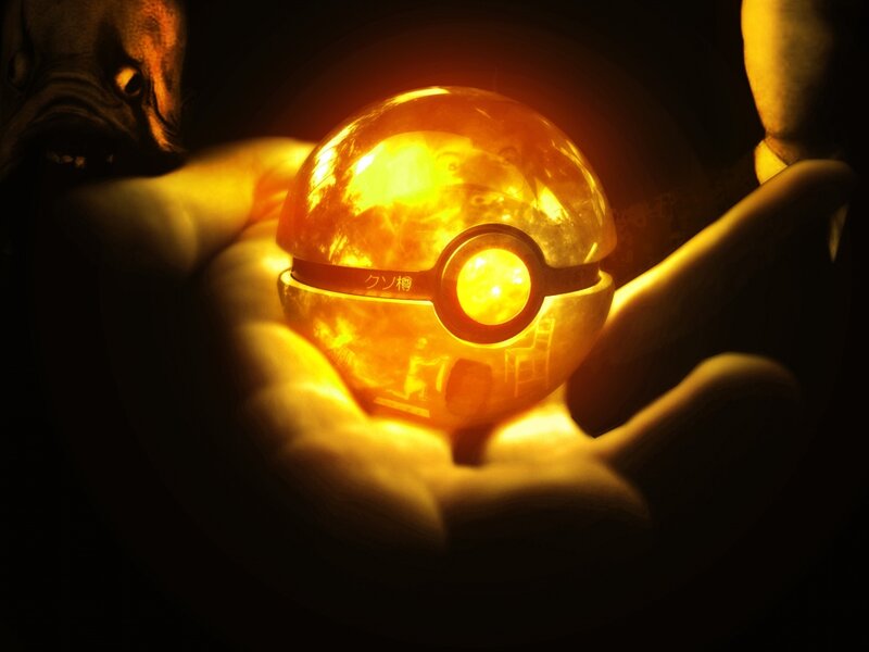 Glowing Pokeball in Hand — Yellow