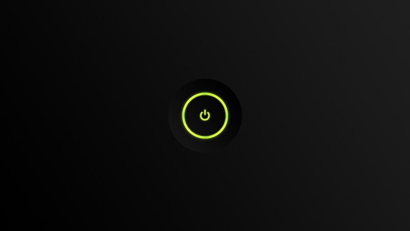 glowing power button on black