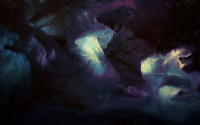 Glowing Purple and Blue Rocks