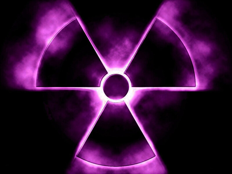 glowing purple radiation symbol