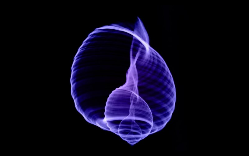 Glowing Purple Spiral Shell — Mystical, Abstract