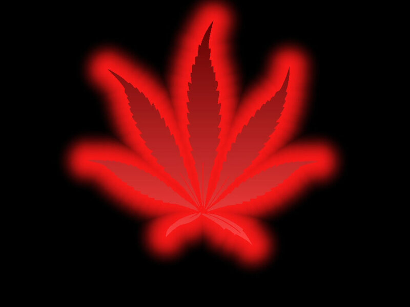 glowing red cannabis leaf