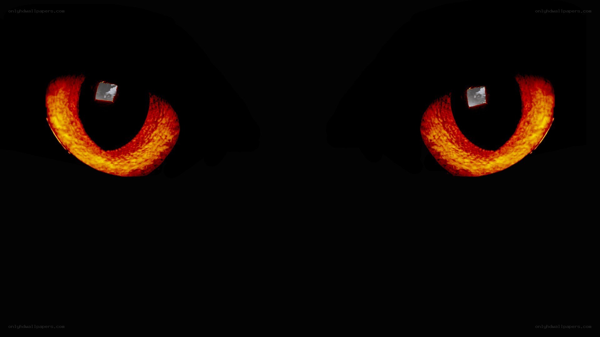 glowing red eyes in darkness