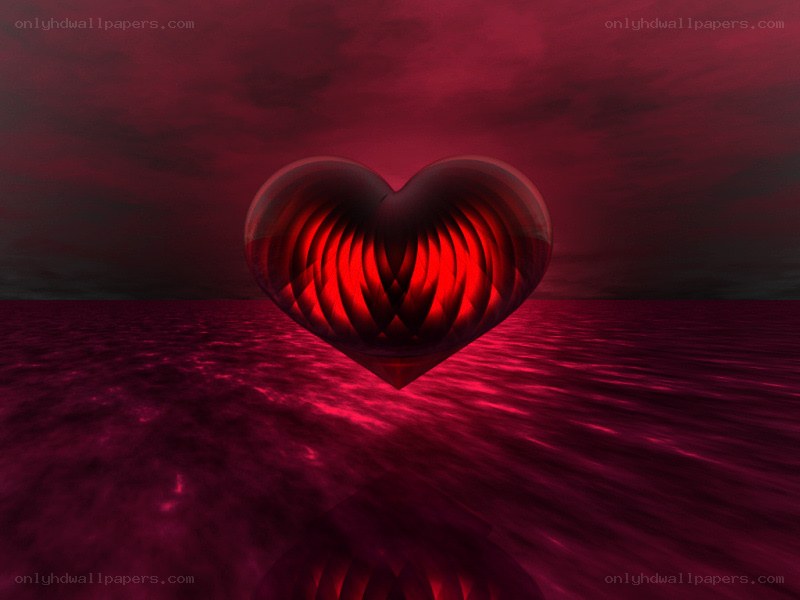 glowing red heart over water