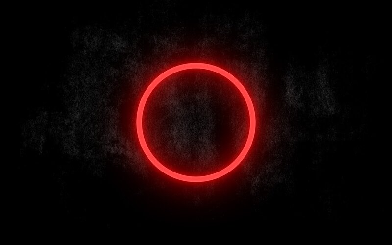 glowing red ring on dark background