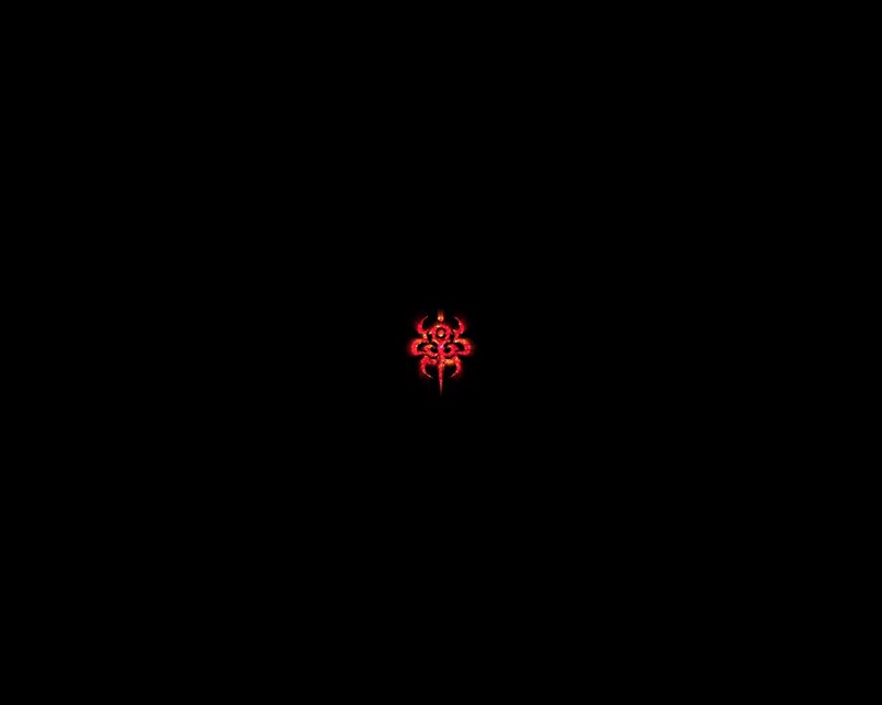 glowing red symbol on black
