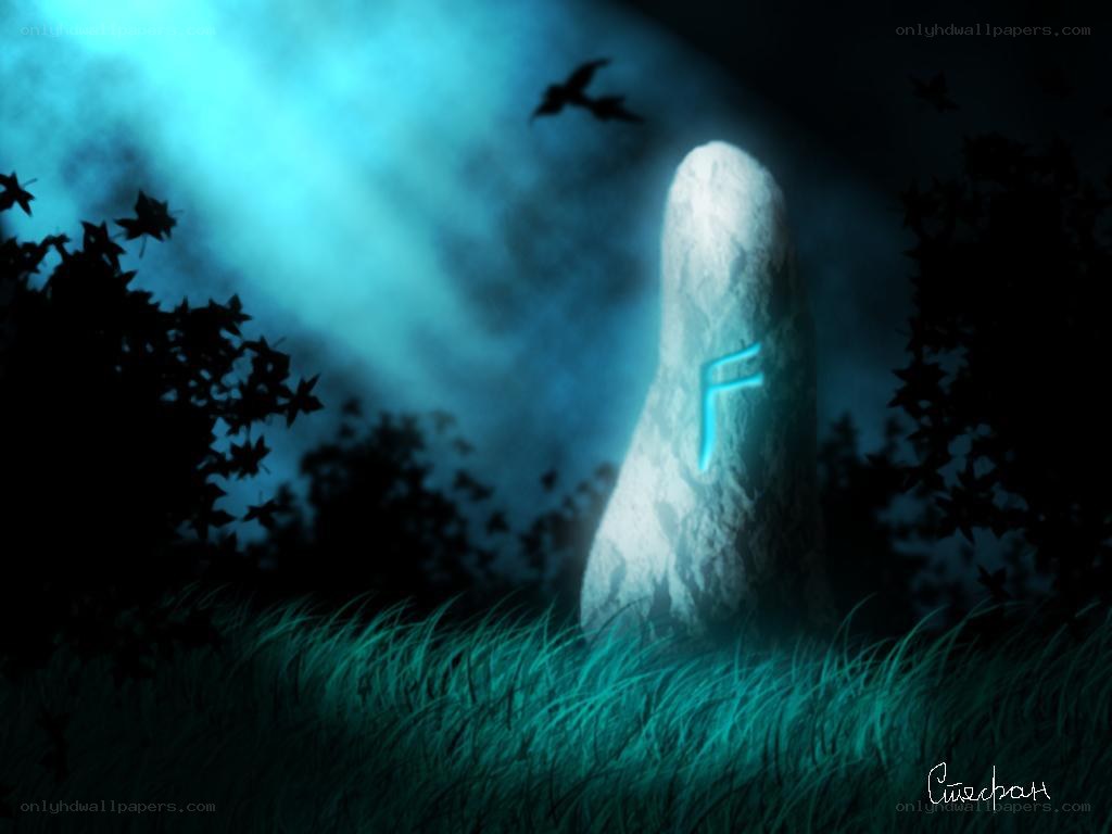 glowing rune stone at night