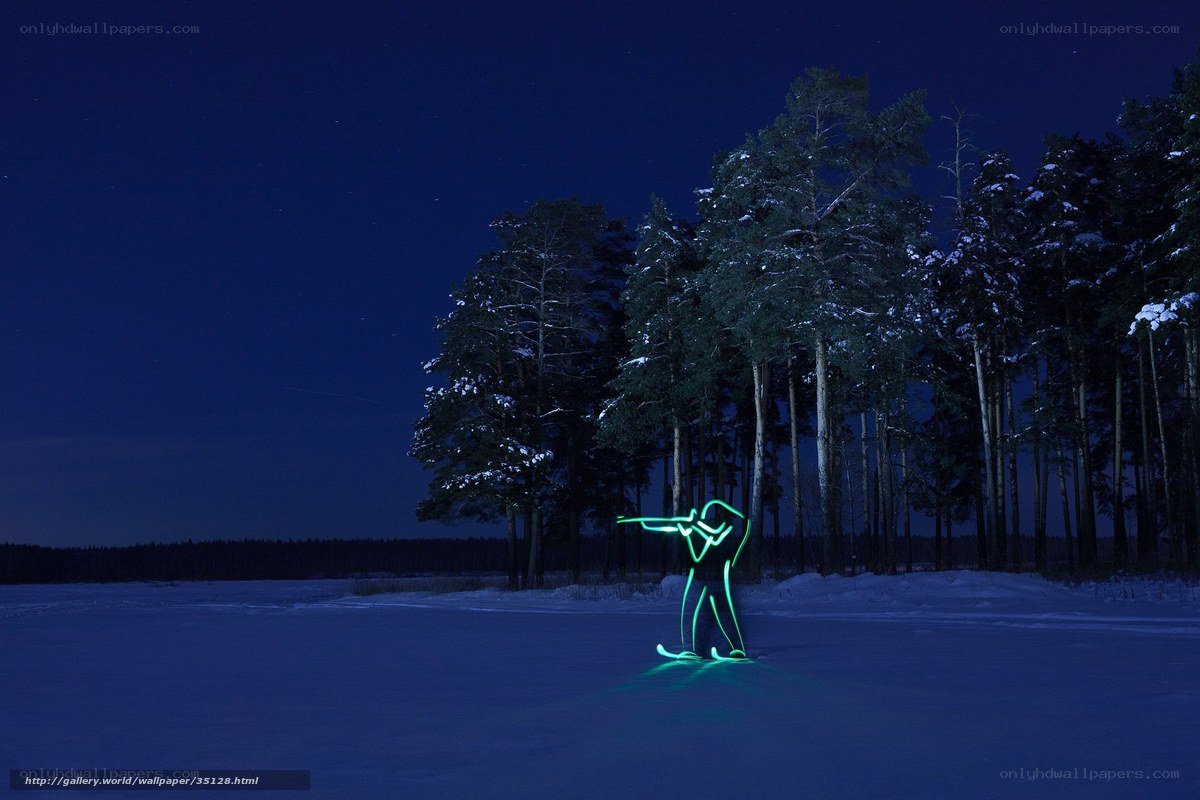 Glowing skier at night