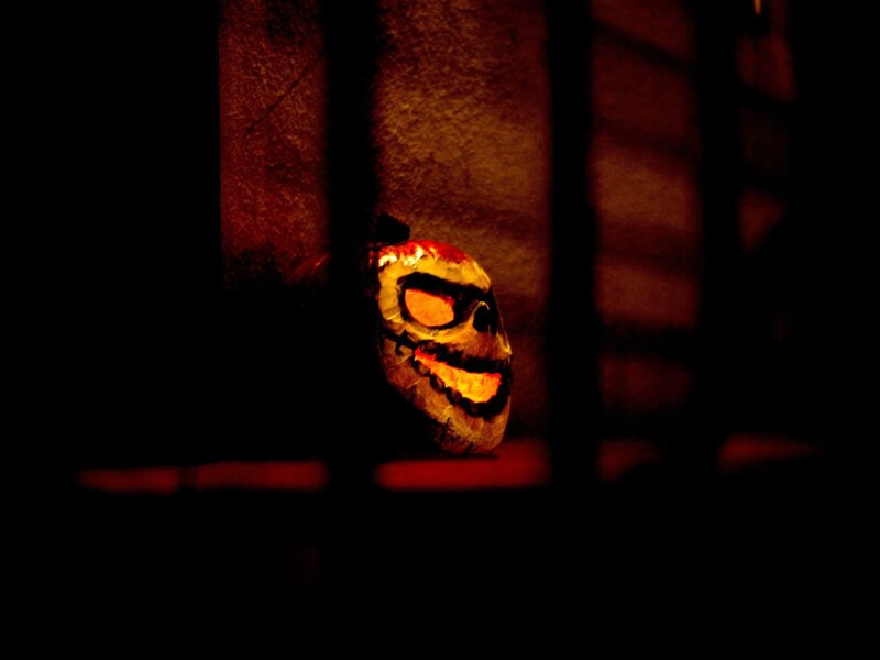glowing skull in dark room