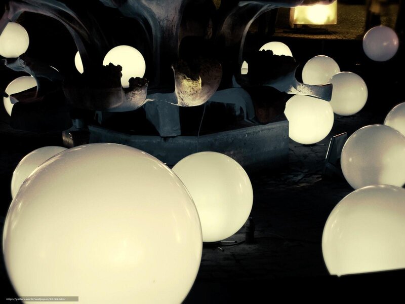 Glowing spheres in dark setting