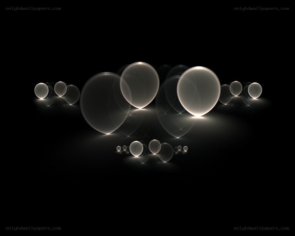 Glowing spheres on black background