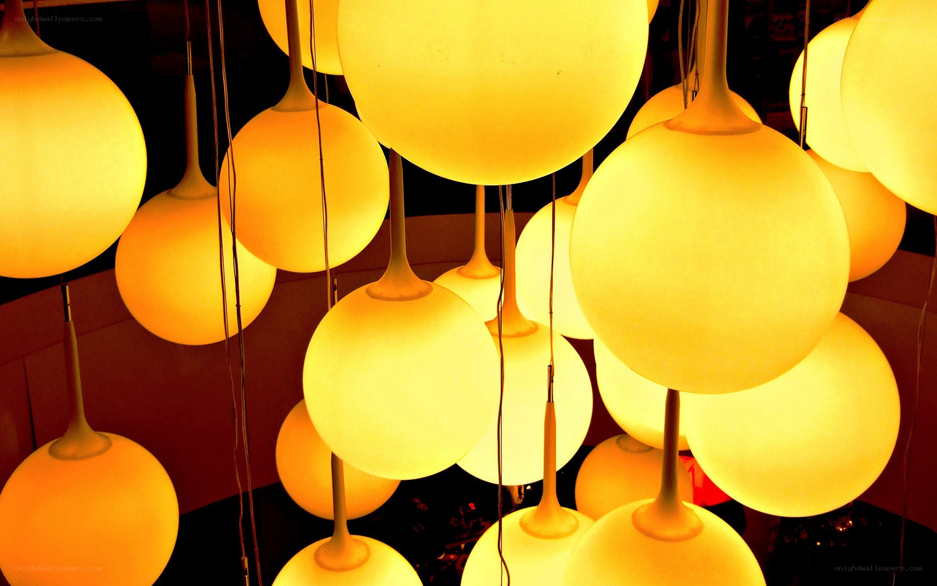 Glowing spherical pendant lights