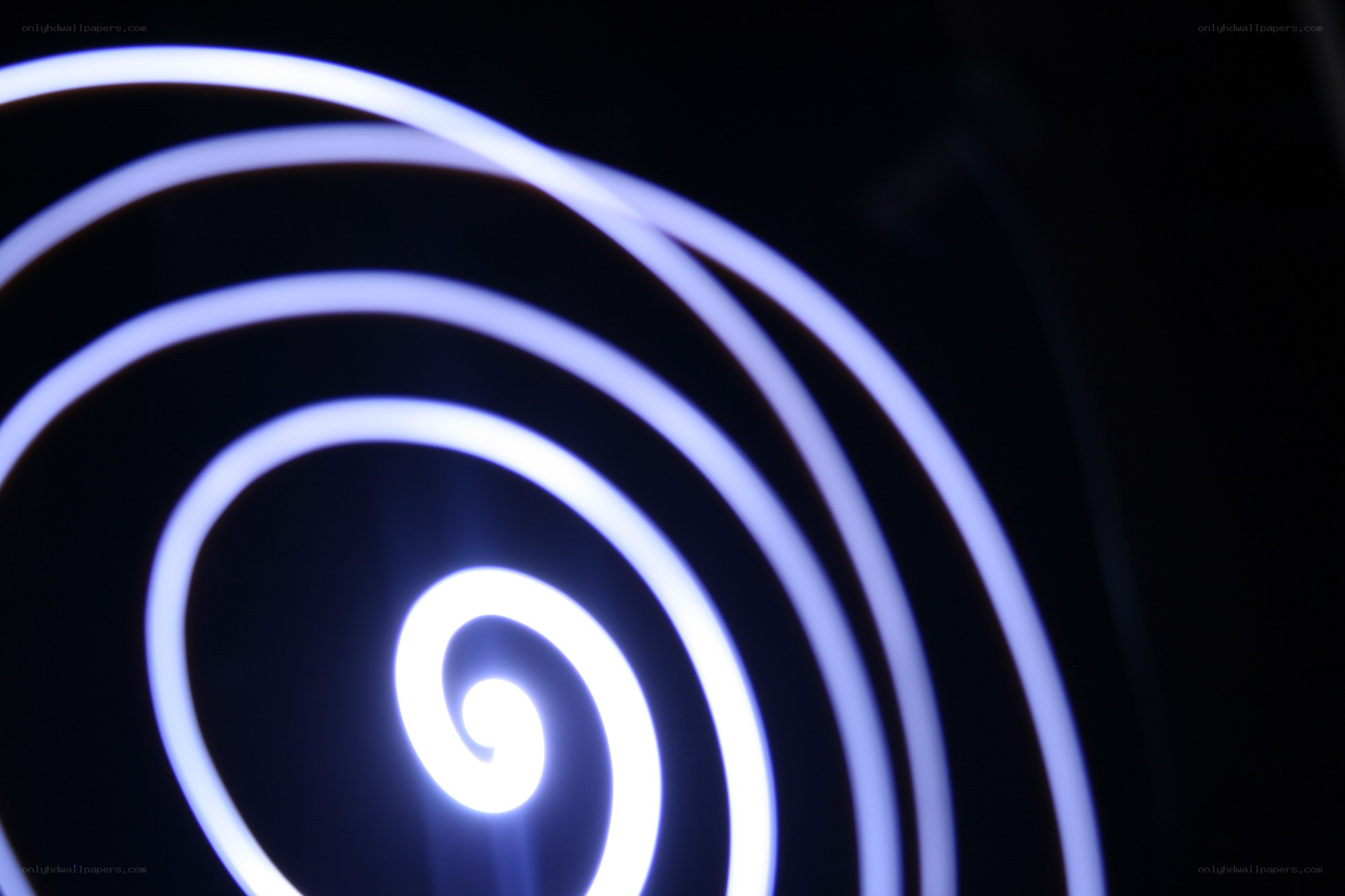 glowing spiral light pattern