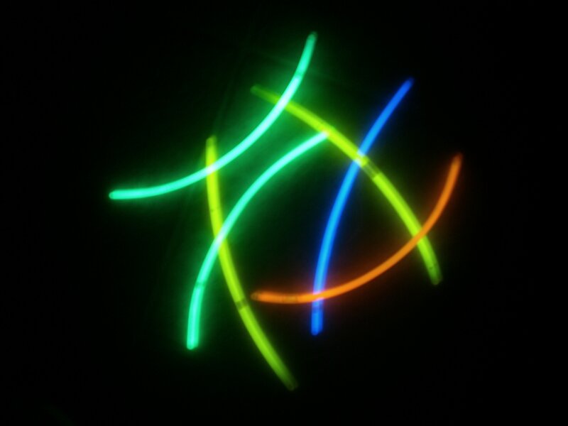 glowing sticks in motion