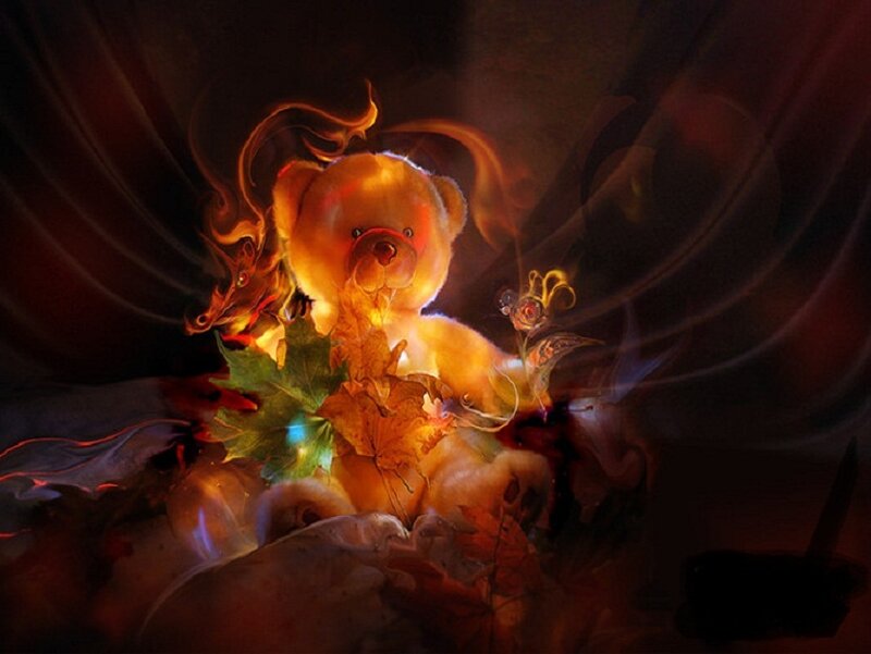 glowing teddy bear with autumn leaves