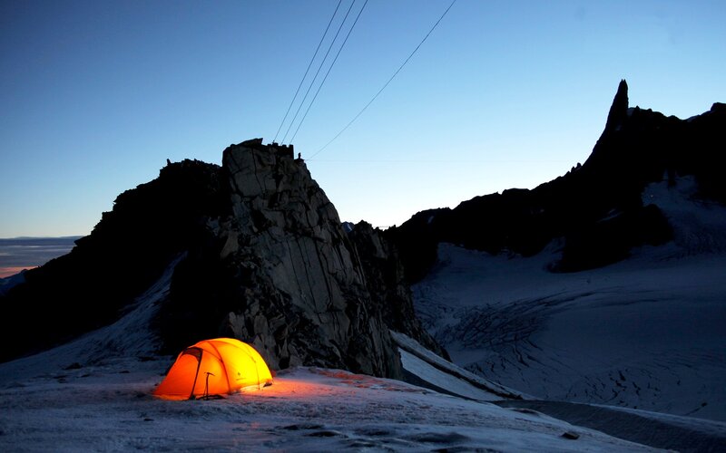 Glowing Tent on Mountain — Orange