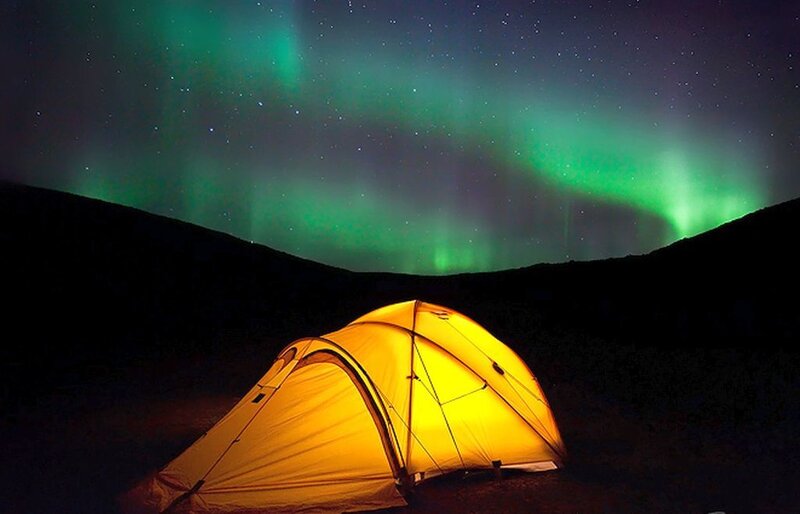 Glowing Tent under Aurora