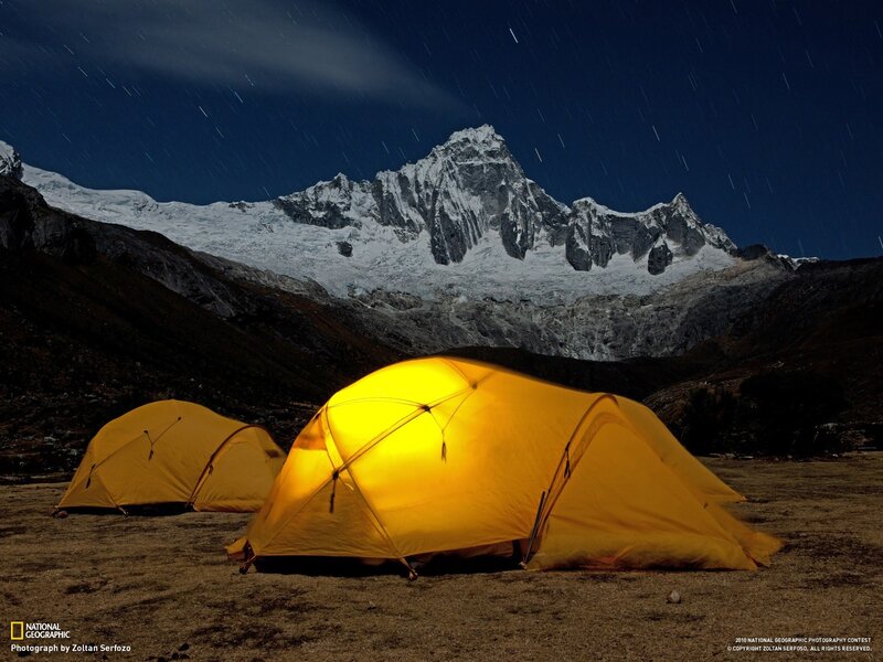 Glowing Tents in Mountains — Yellow, Dramatic