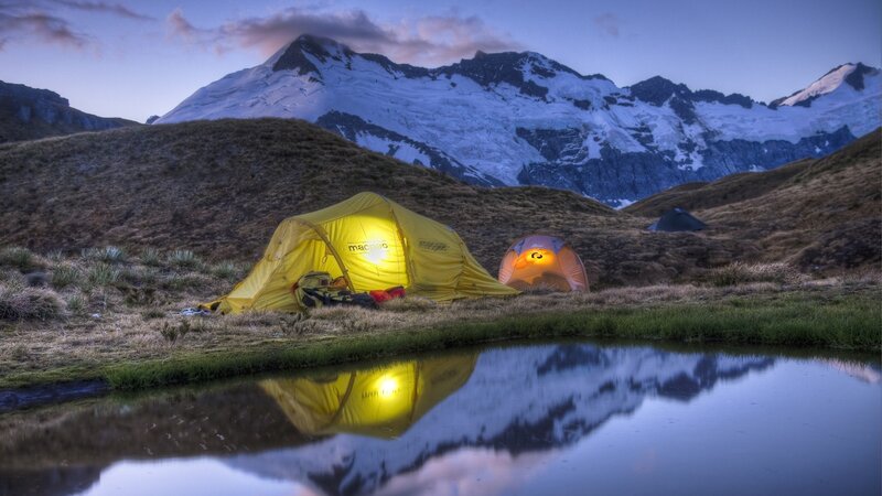 Glowing Tents in Mountains — Yellow