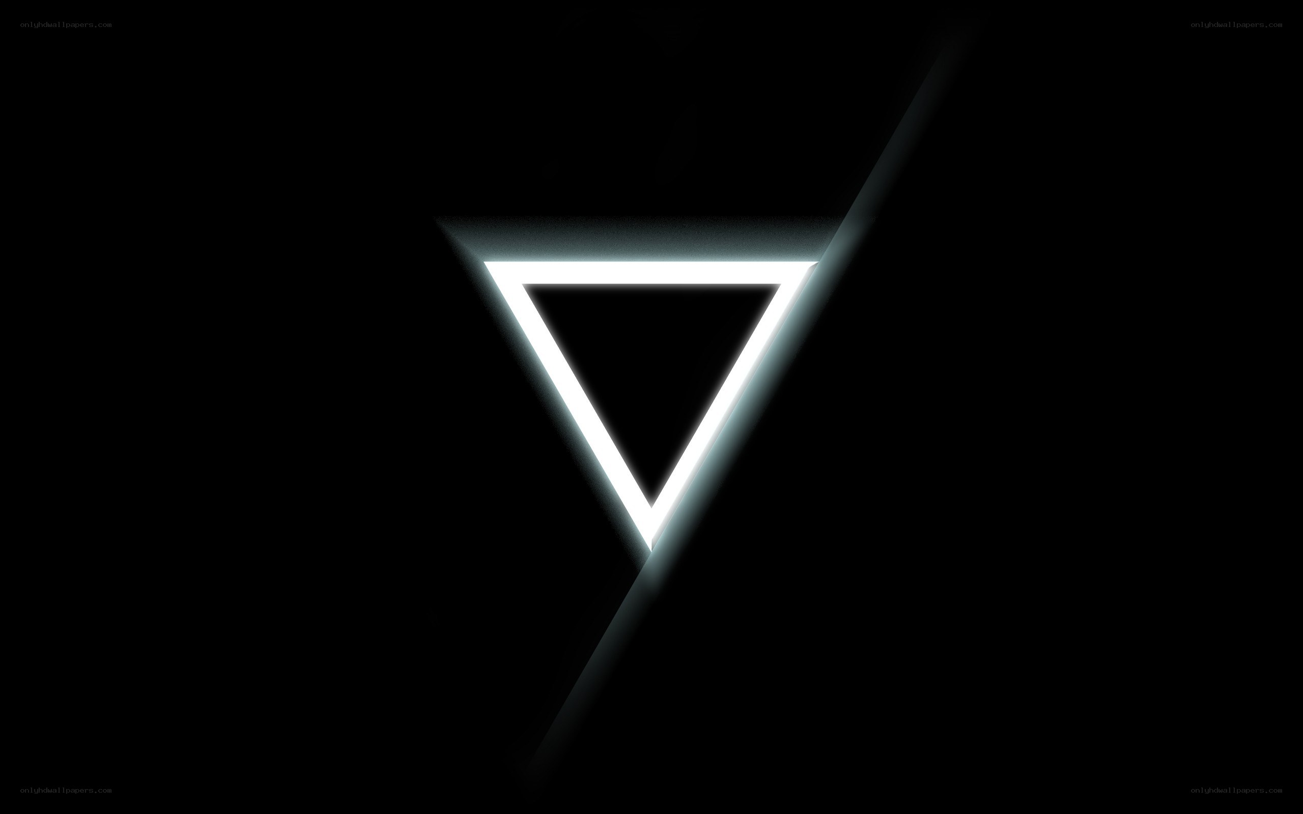 glowing triangle on black background