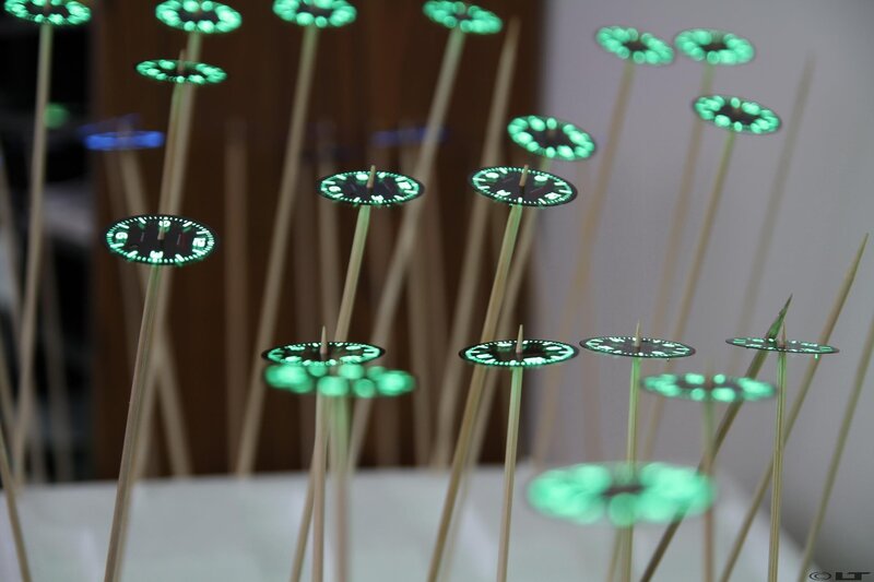 Glowing watch dials on sticks