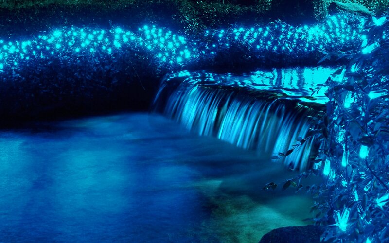 Glowing Waterfall at Night