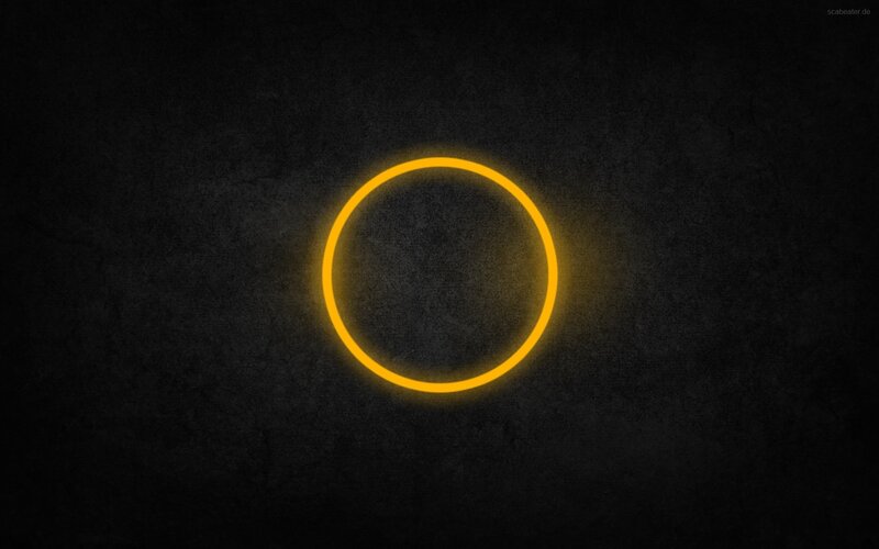 glowing yellow circle on dark background