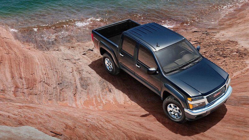 GMC Canyon on rocky shore