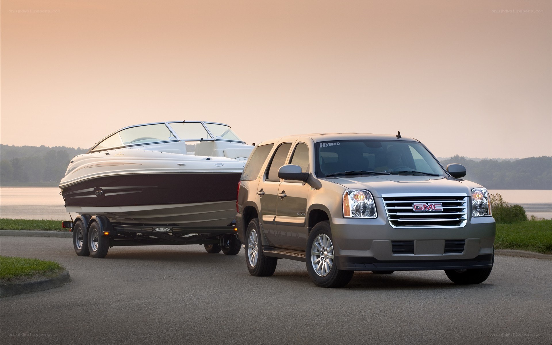 GMC SUV towing a boat