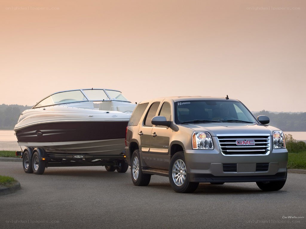 GMC SUV towing a boat