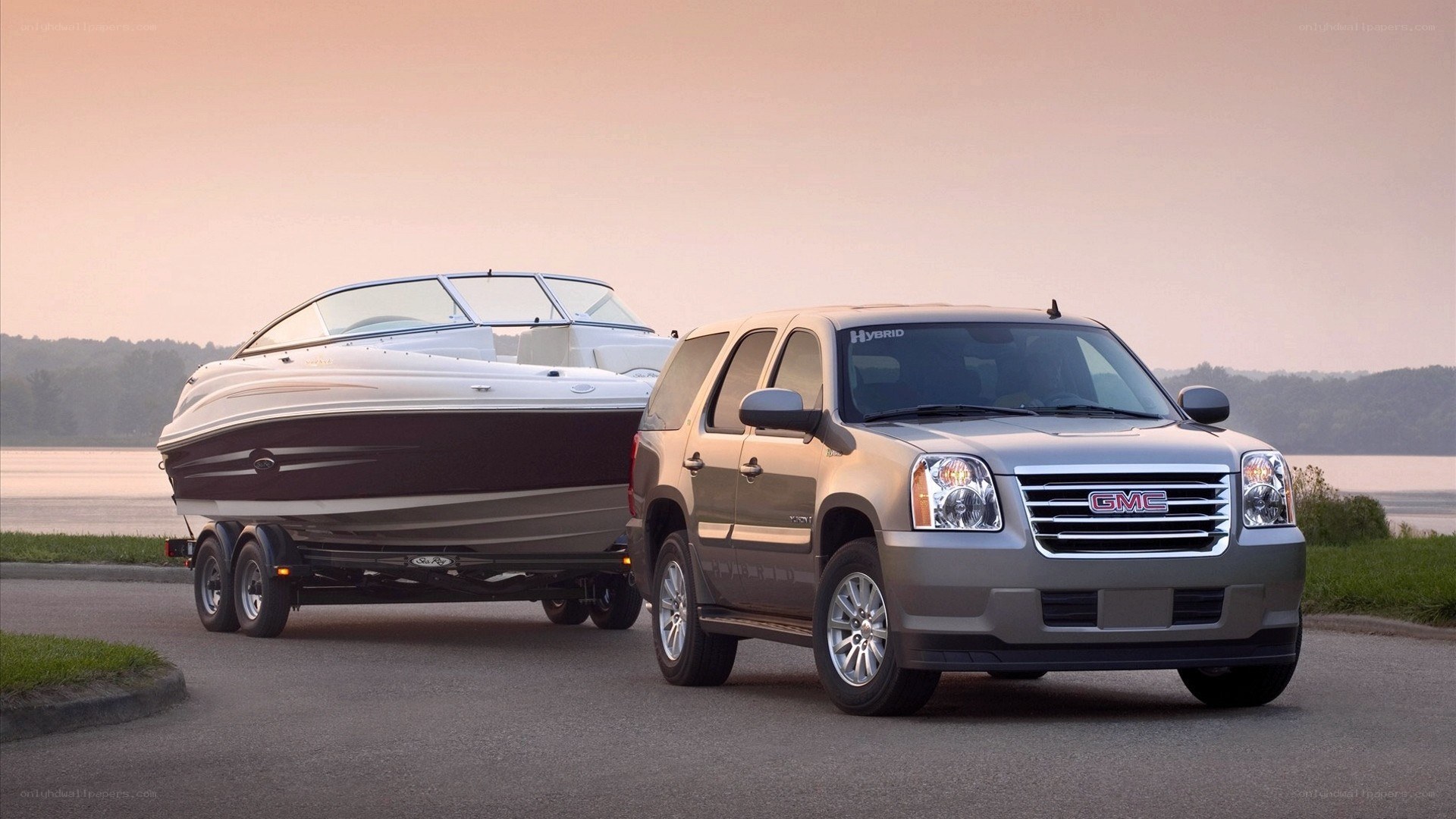 GMC SUV towing a boat
