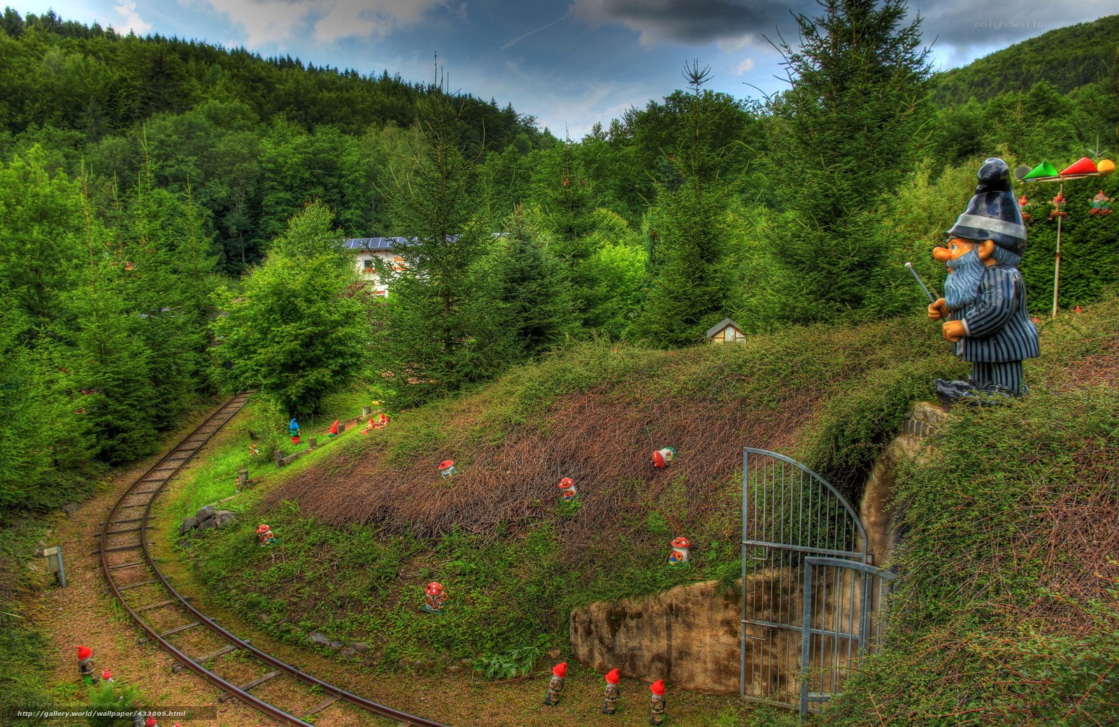 Gnome village by train tracks