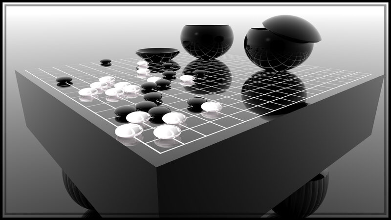 Go board with stones and bowls