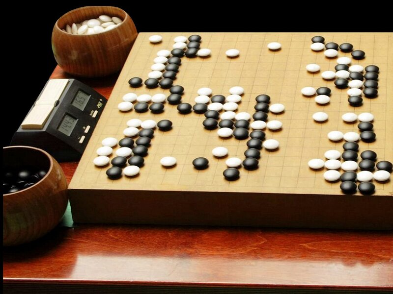 Go board with stones and timer