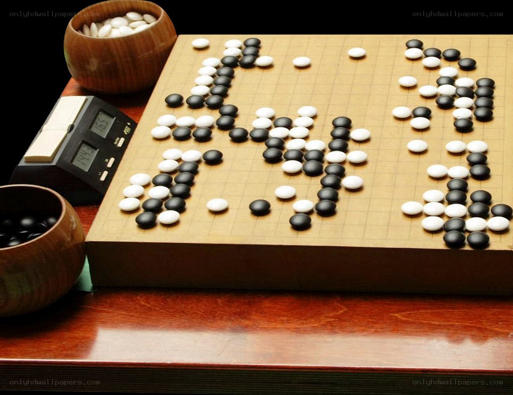 Go board with stones and timer