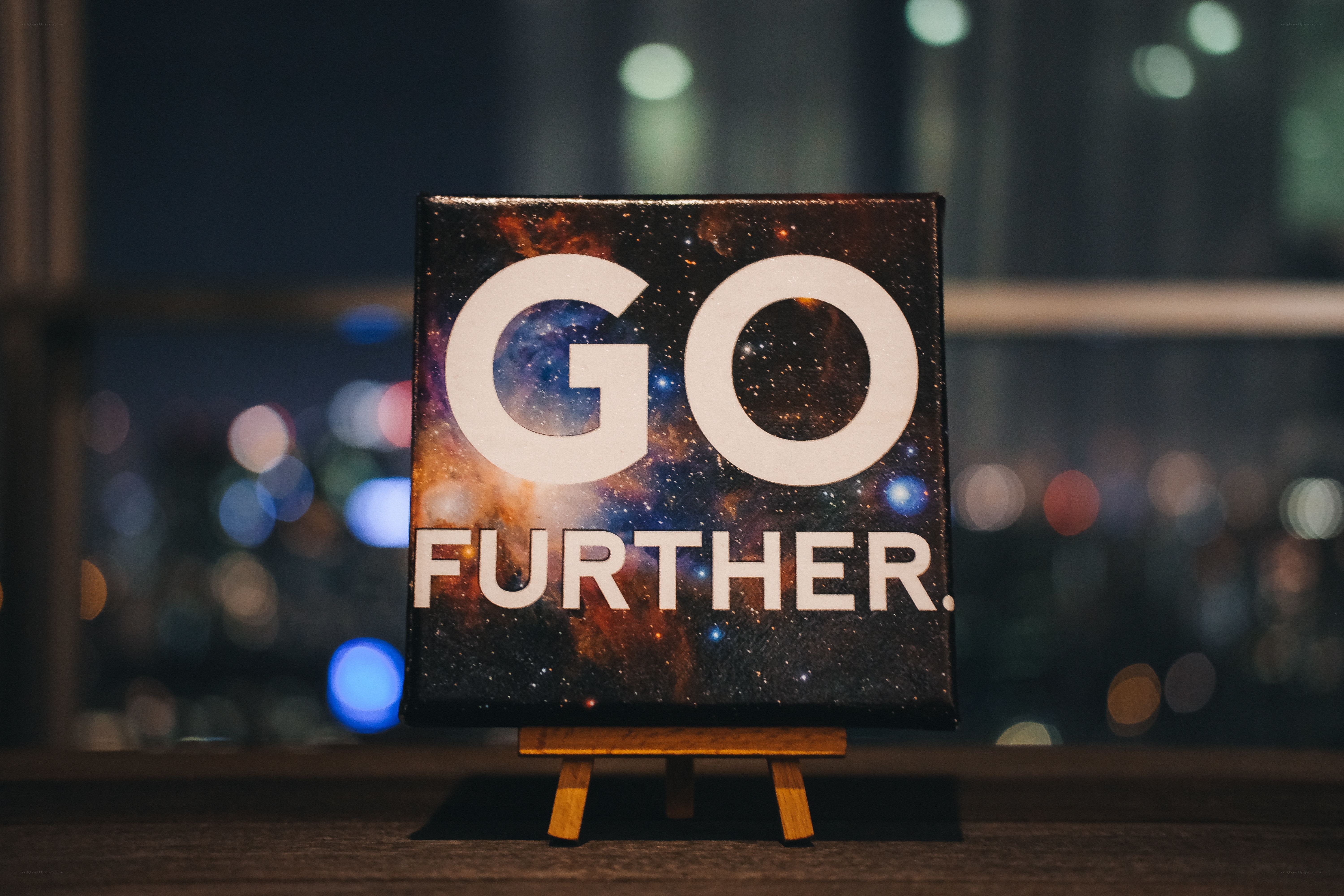 Go Further sign on easel