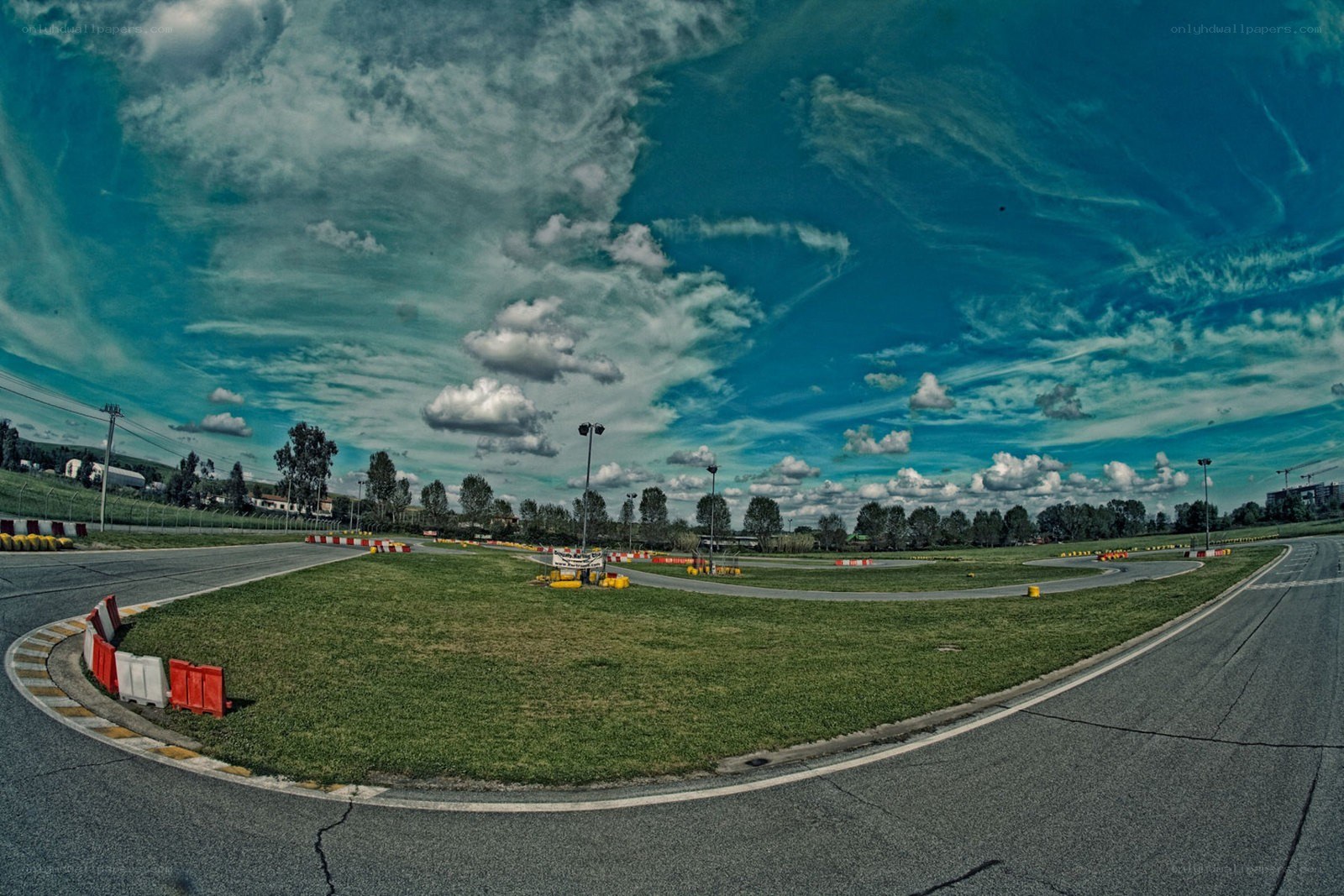 Go-kart track under cloudy sky