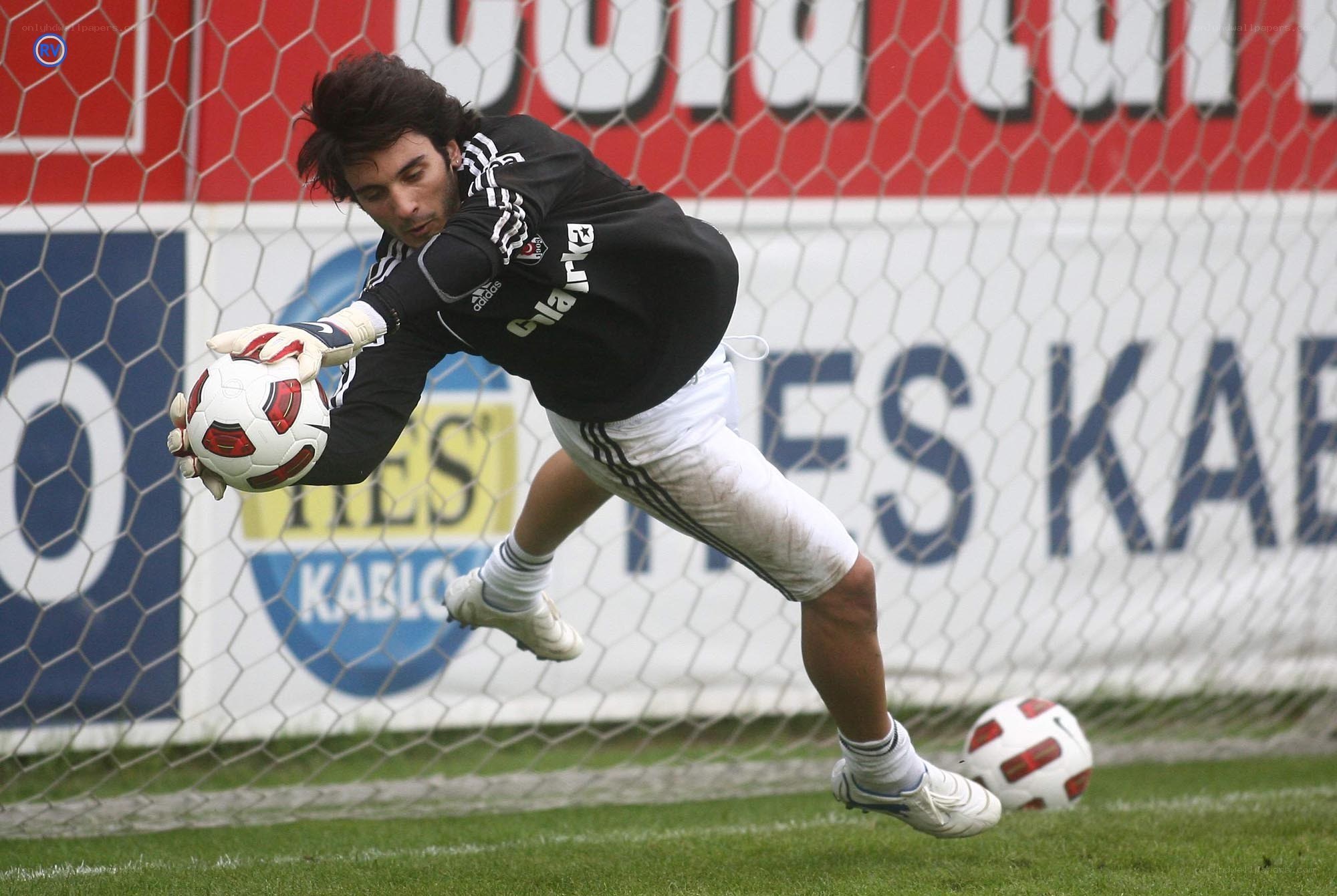 goalkeeper catching soccer ball