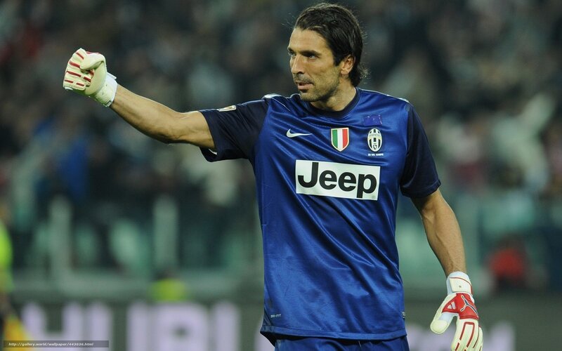 Goalkeeper in Blue Jersey — Focused