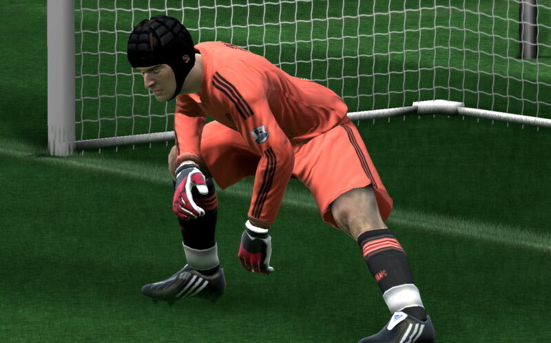 goalkeeper in orange kit