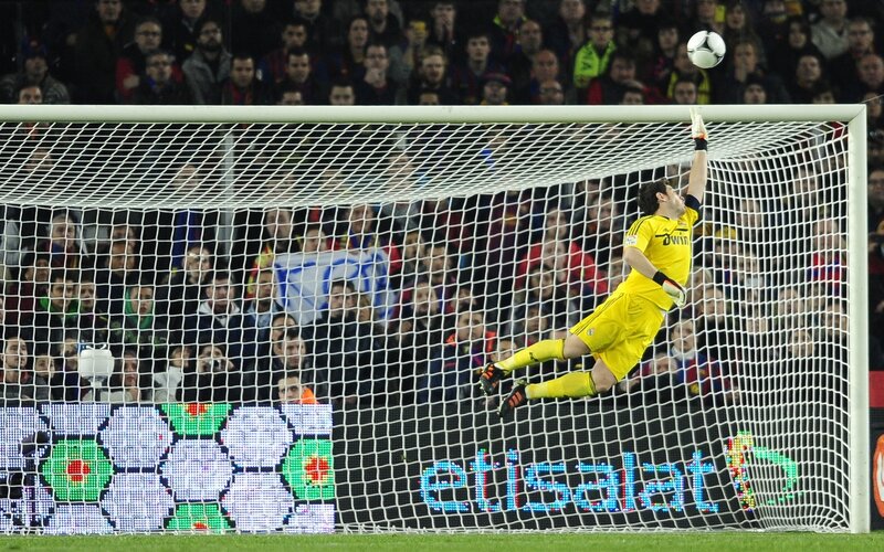 Goalkeeper Jumping for Ball — Yellow
