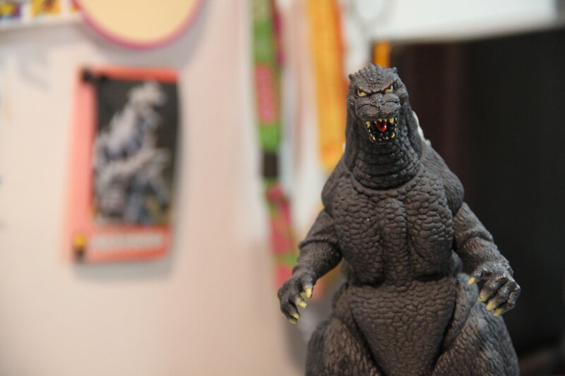 Godzilla action figure on display