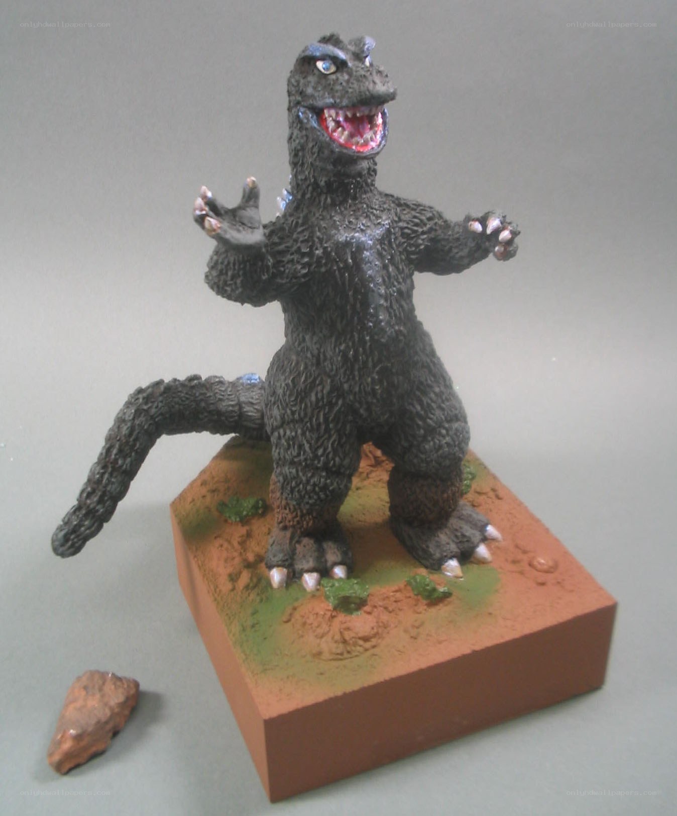 Godzilla figure on base