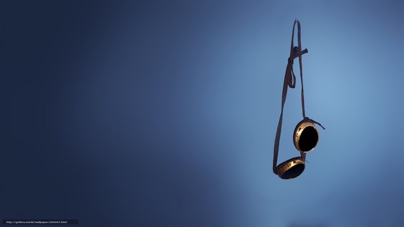 goggles hanging on blue background
