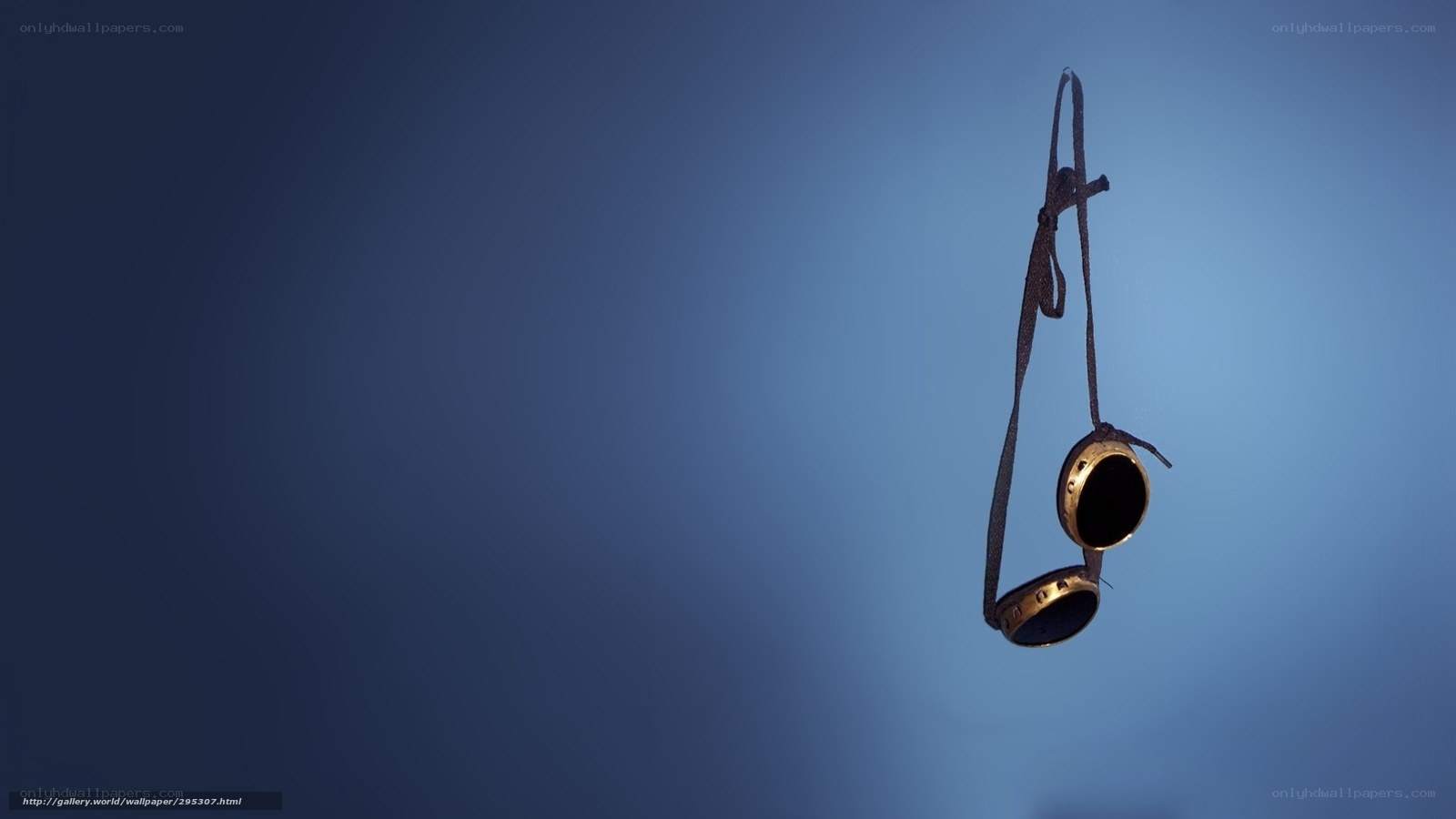 goggles hanging on blue background