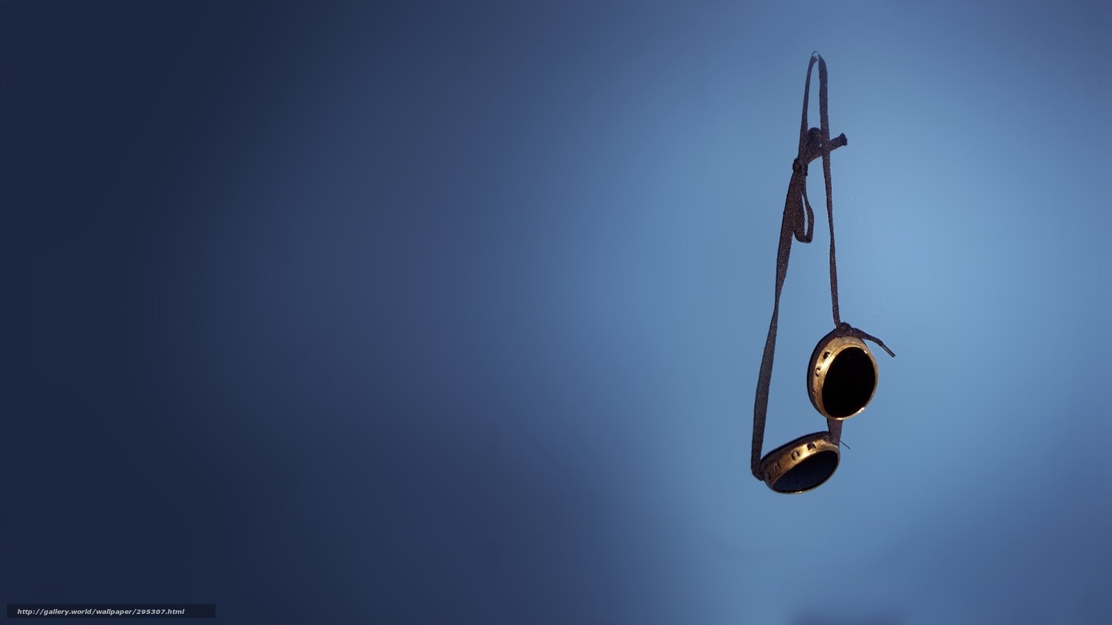 goggles hanging on blue background